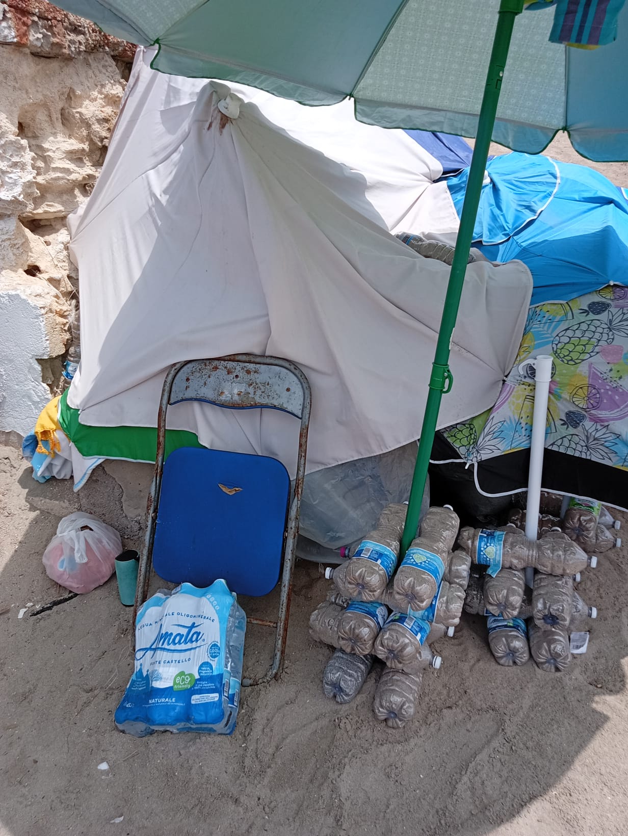 Beach umbrellas, sunbeds, towels, inflatables and beach games sold by Aziz in Gallipoli