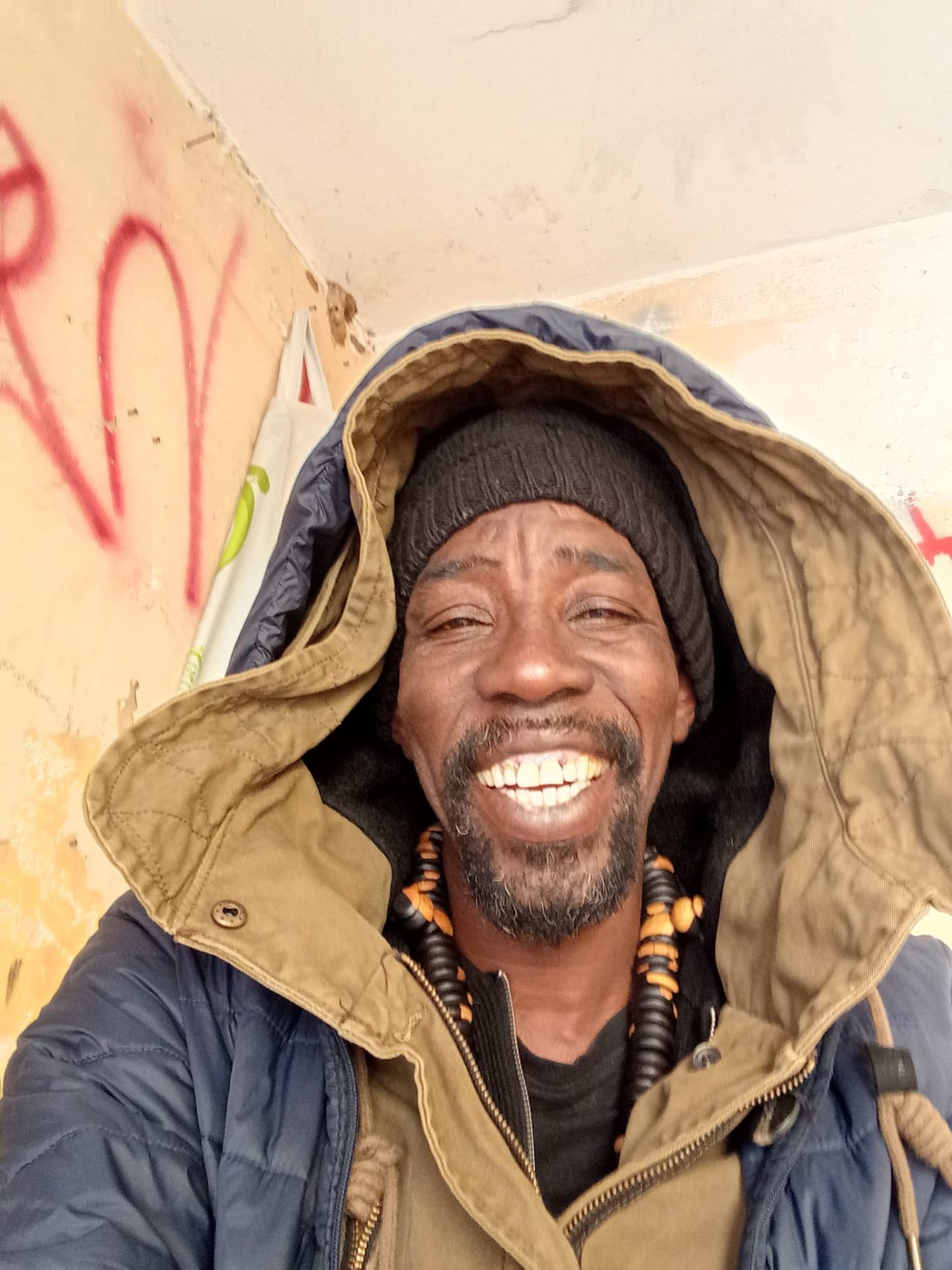 Aziz smiling, beach vendor in Gallipoli